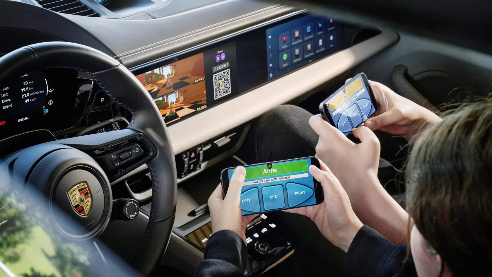Crianças a jogar videojogos no Porsche Macan 2026
